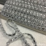 Тесьма Chanel серебряная со шнуром