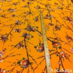 Креп оранжевый с цветами