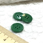 Пуговицы плательные зеленые 1.5см